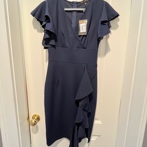 Womens deep V neck ruffle cocktail dress.  Size small navy blue